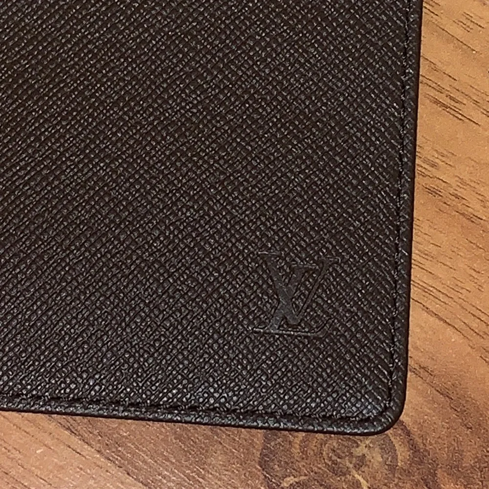 Authentic Louis Vuitton Taiga Leather ID / Card Holder